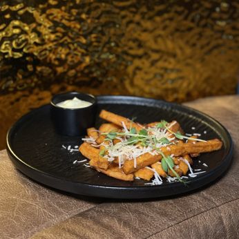 Батат з пармезаном (130/50 г)