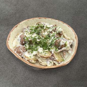 Молода картопля з лисичками у вершковому соусі (300 г)