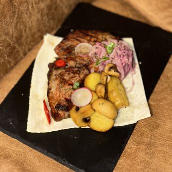 Стейк свинний на кістці (Вагова страва/100 г)