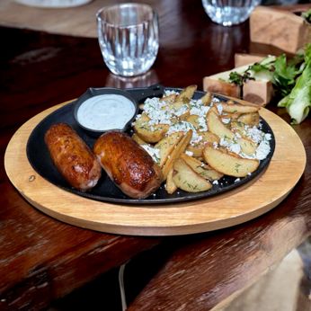 Пательня зі свинними ковбасками (600 г)