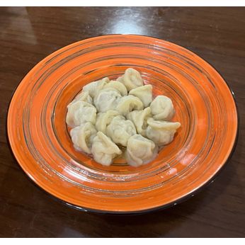 Пельмені зі свининою та курятиною (240/30 г)
