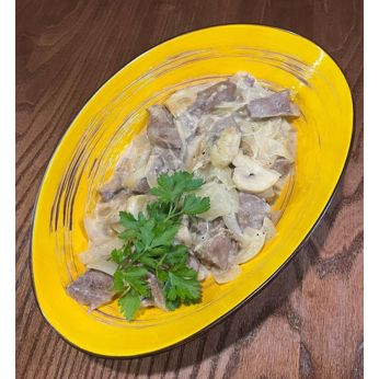 Язик тушкований з грибами (250 г)